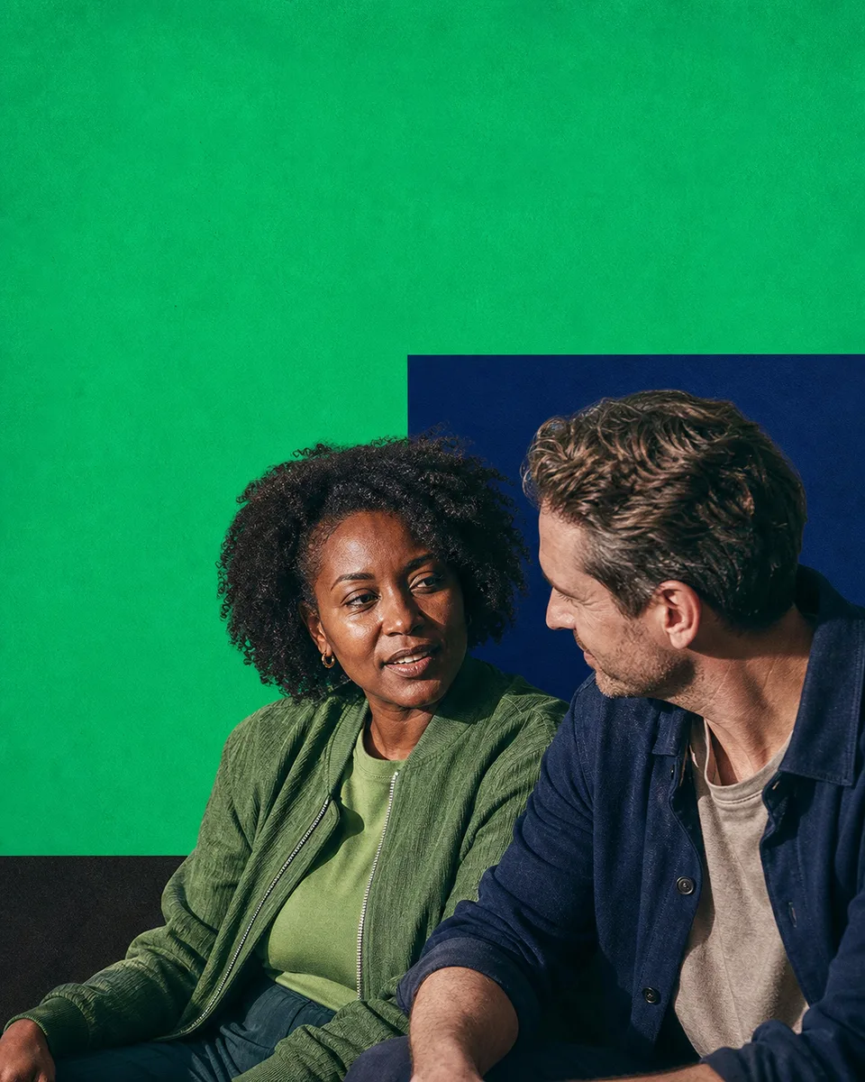 Two people sharing a relaxed conversation away from the workday